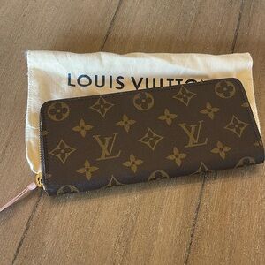 Pristine like NEW authentic Clemence Louis Vuitton wallet never worn